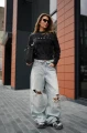 Sweter-damski-OLAVOGA-PAUSE-2026-czarny.webp